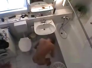 Spying MILF in the bathroom